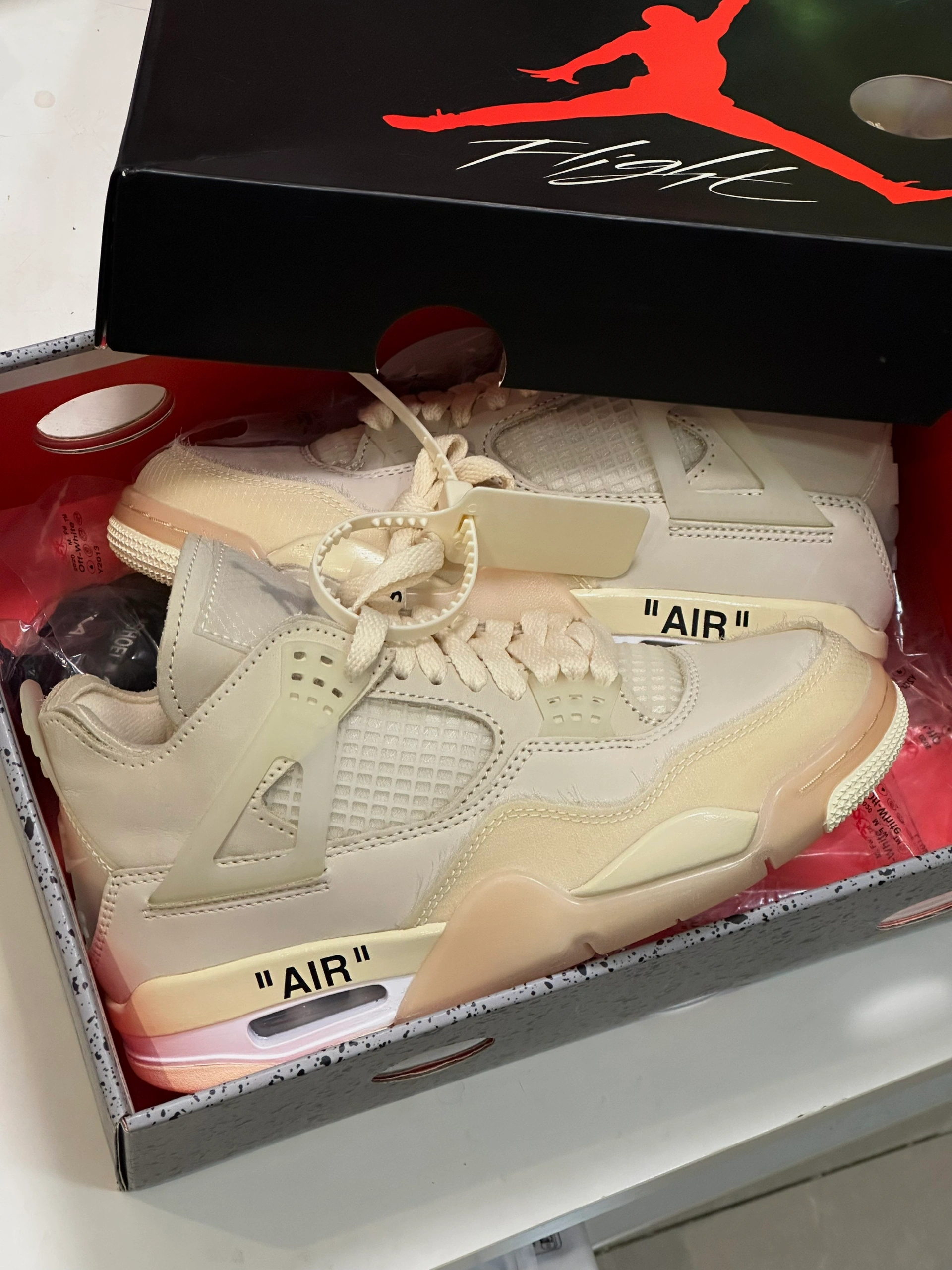 Jordan 4 Retro Off-White Sail (W) photo review